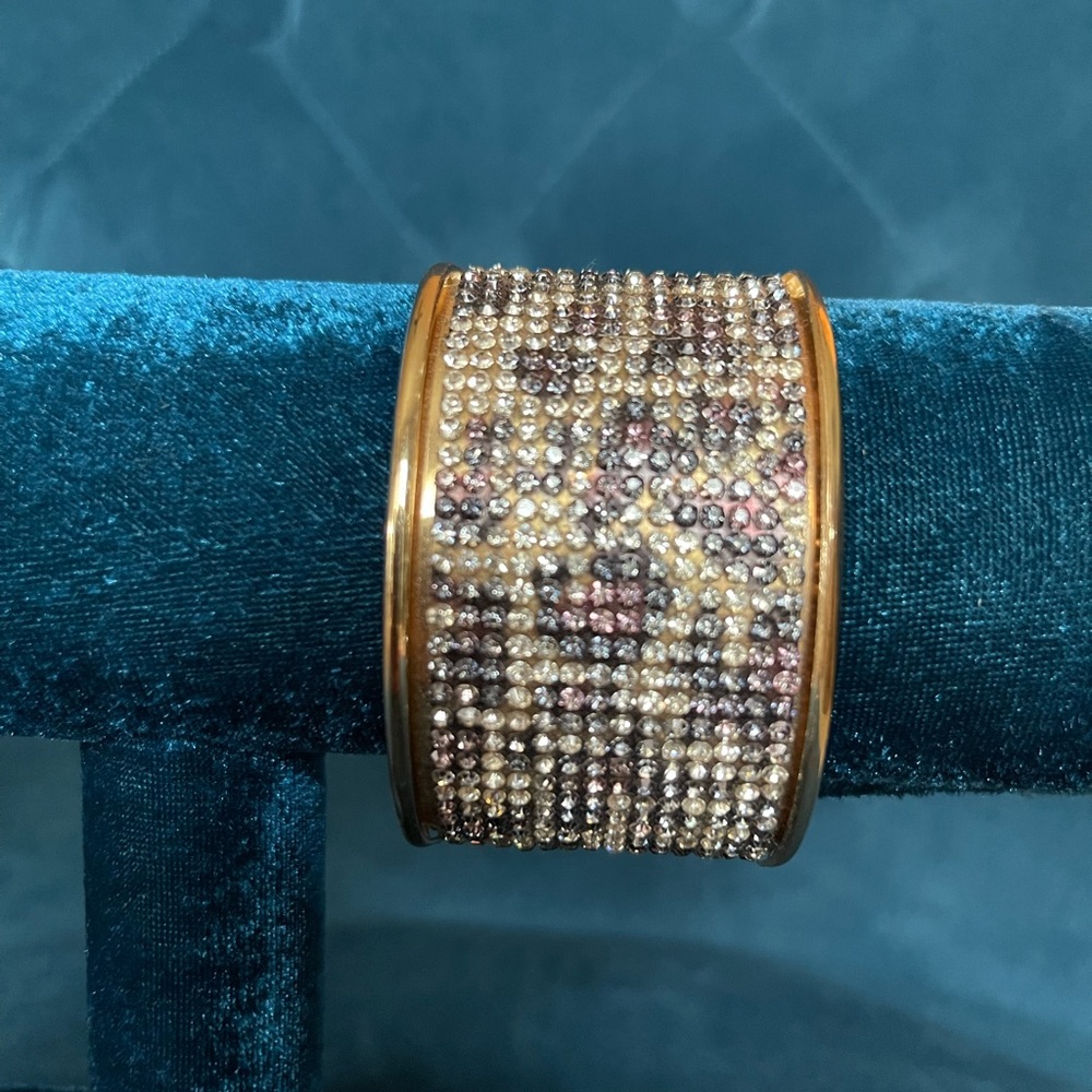 Leopard rhinestone cuff.